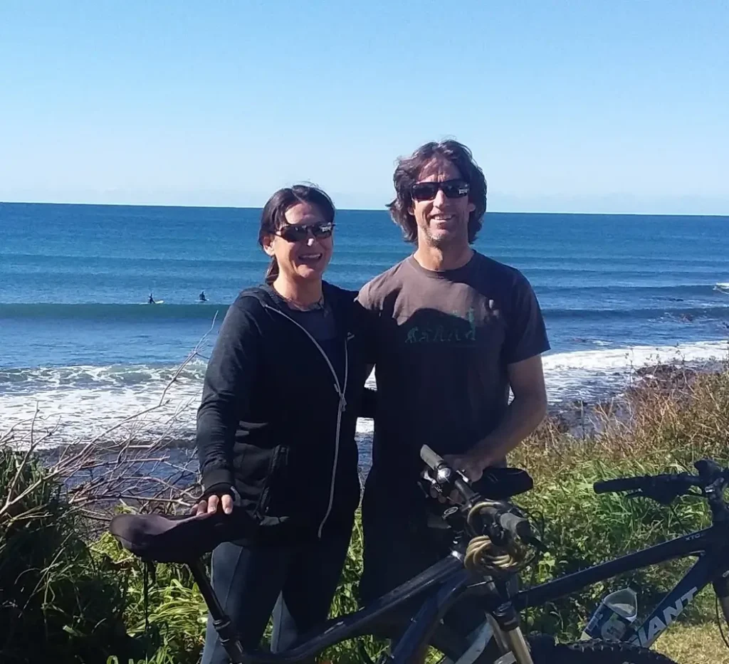 Couple enjoying freedom from trading success with AIE